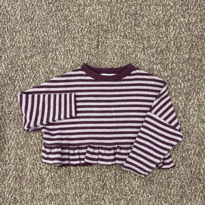 Maglioncino bimba a righe con volant Fiorile